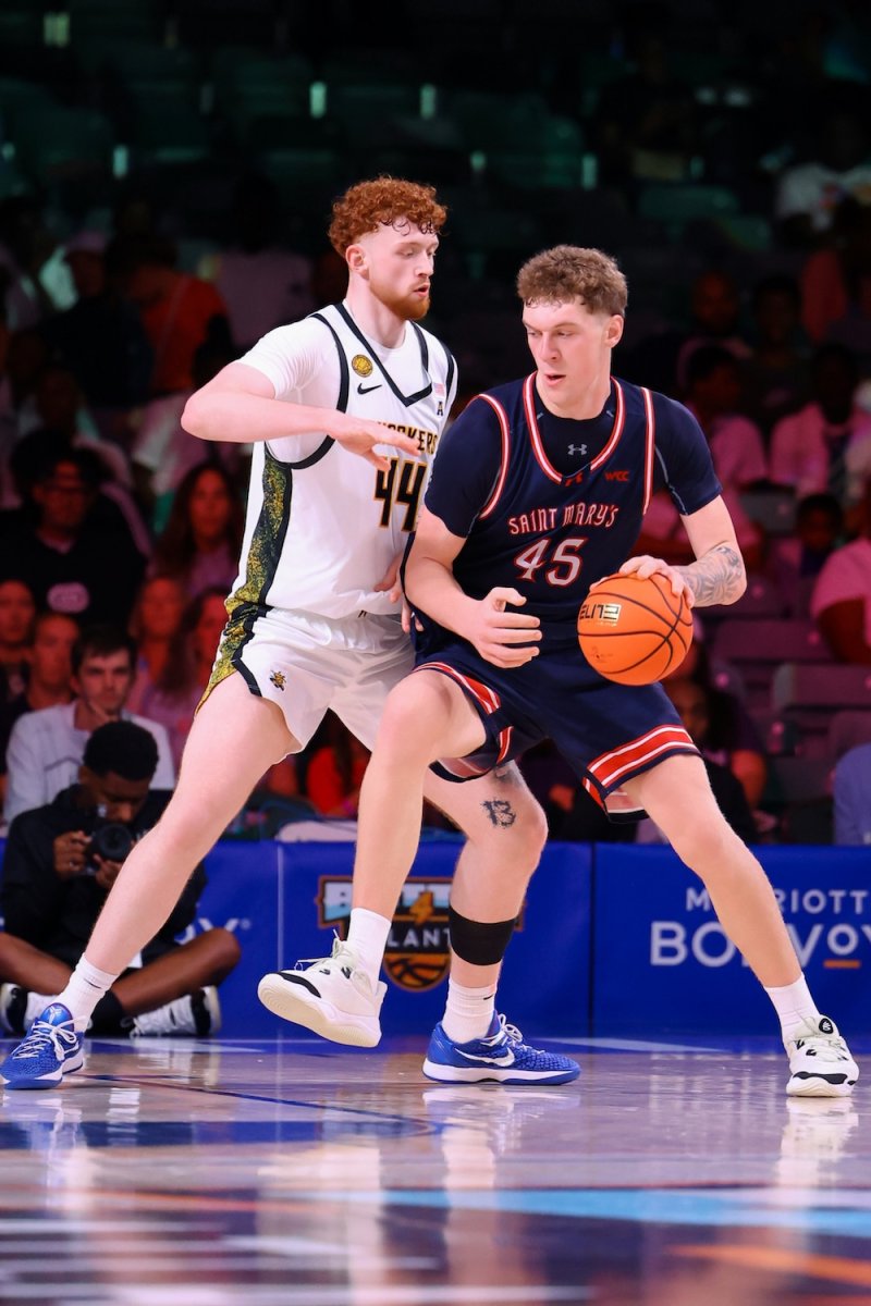 Basketball player Andrew McKeever drives against Wichita State in November 2025