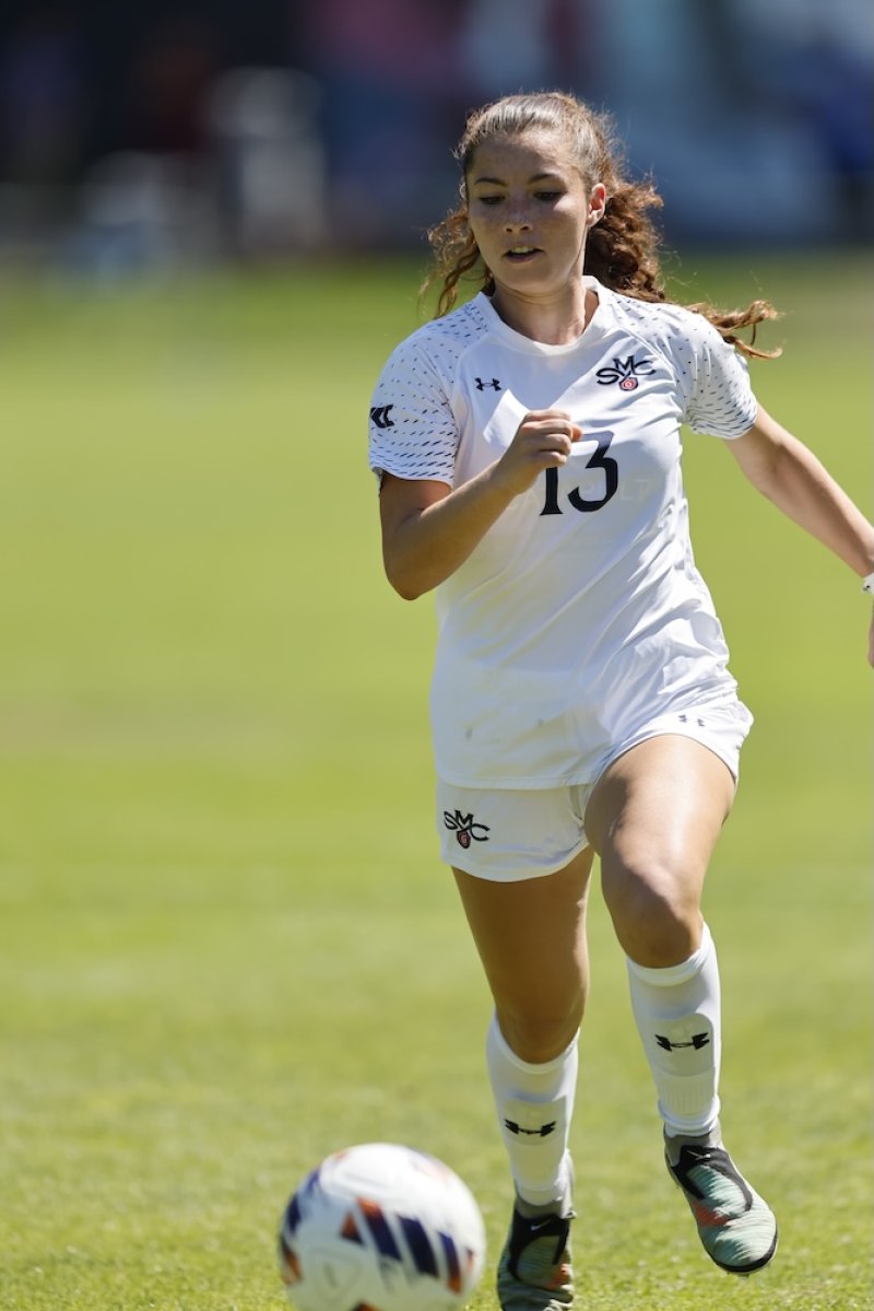 Soccer player Ashlyn Vaughn drives against Boston University in fall 2025