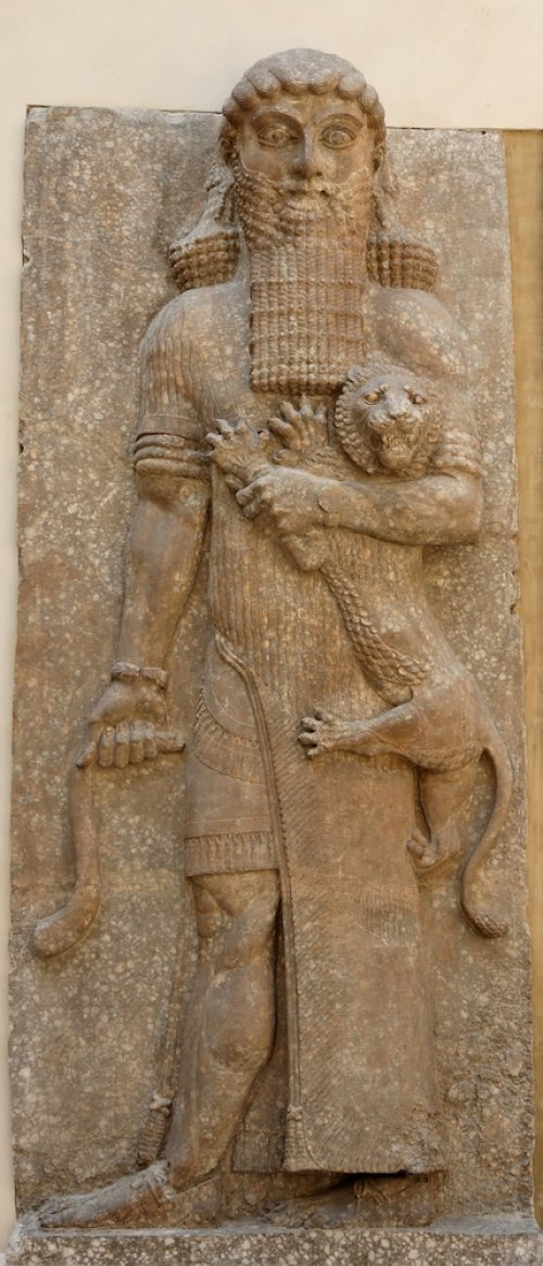 Carving of hero Gilgamesh defeating a lion