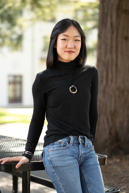 Melody Ng posing on campus