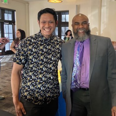 two men smiling