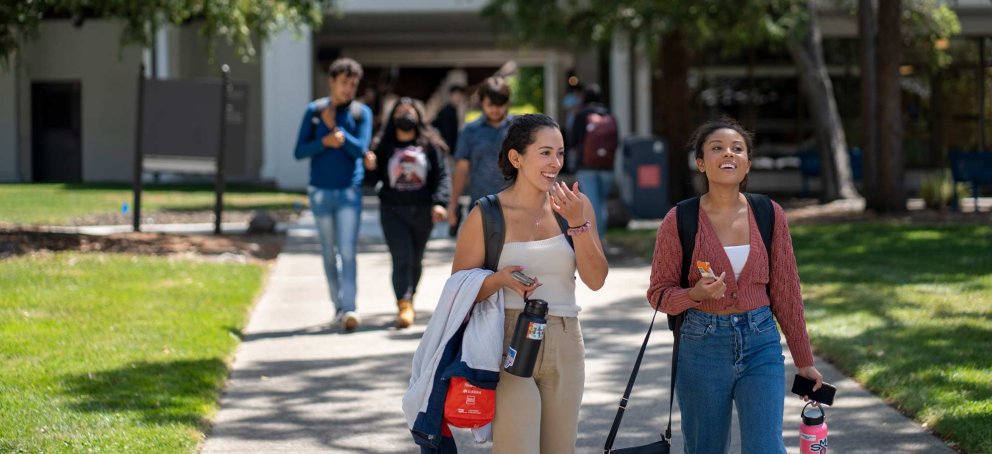 Students walking on Saint Mary's College campus talking
