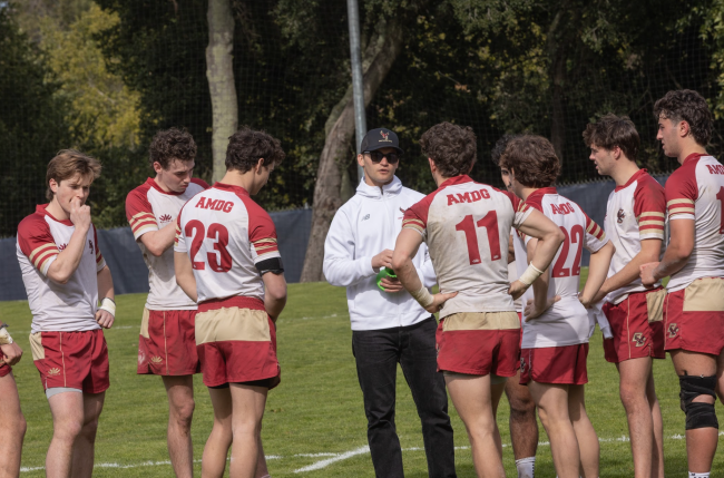 SMC Alum Holden Yungert ‘17 encourages the Boston College Players during the half to continue the fight against the Gaels.