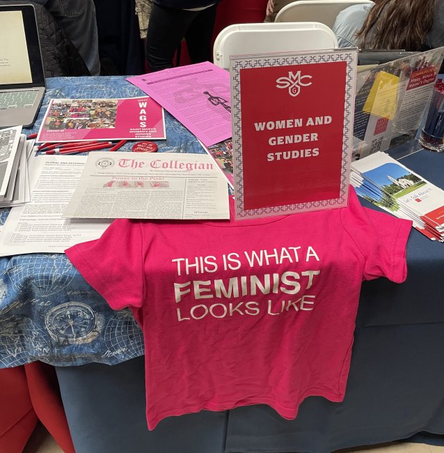 Table with shirts, pens