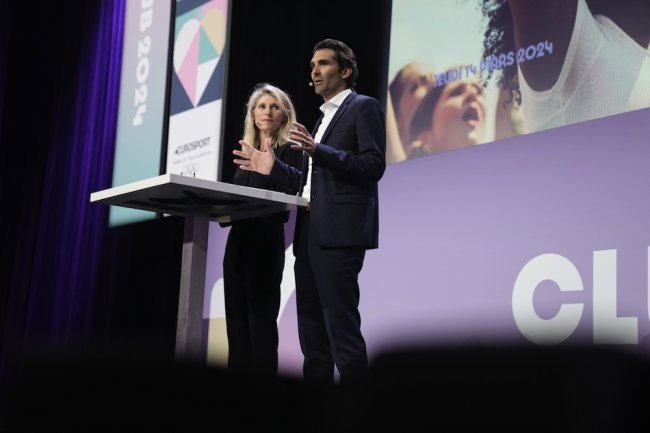 Romain Lachens and colleague onstage for 2024 Olympics in Paris