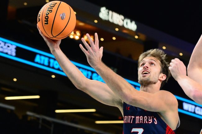 Men's Basketball player Augustas Marciulionis shoots