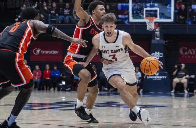 Men's Basketball Player Augustas Marciulionis drives against Oregon State on March 1, 2025