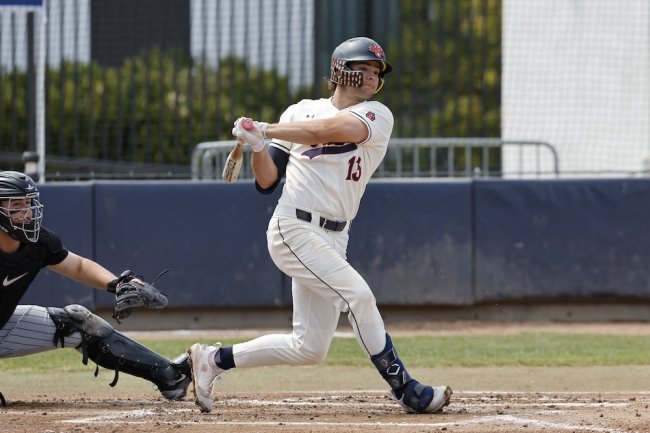Baseball player Eddie Madrigal hits against Portland in April 2025