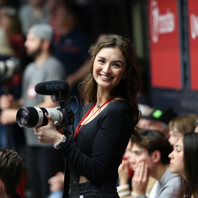 A student with a camera