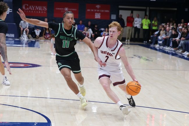 Men's basketball player Joshua Dent drives against North Texas in November 2025
