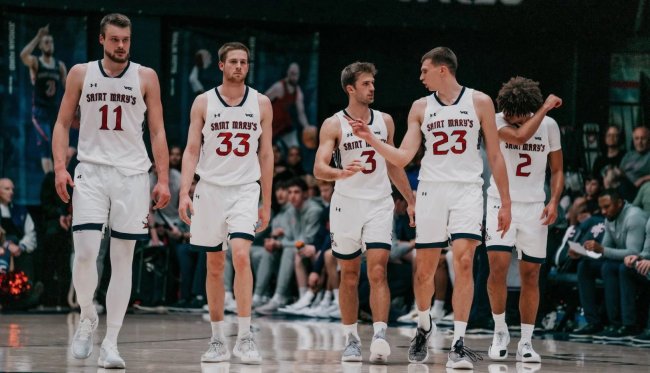 Five men's basketball players walking during game against Gonzaga in 2025