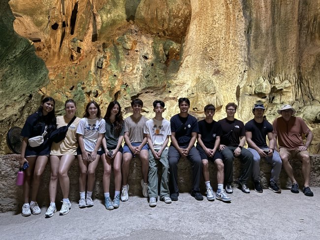 Students in a cave