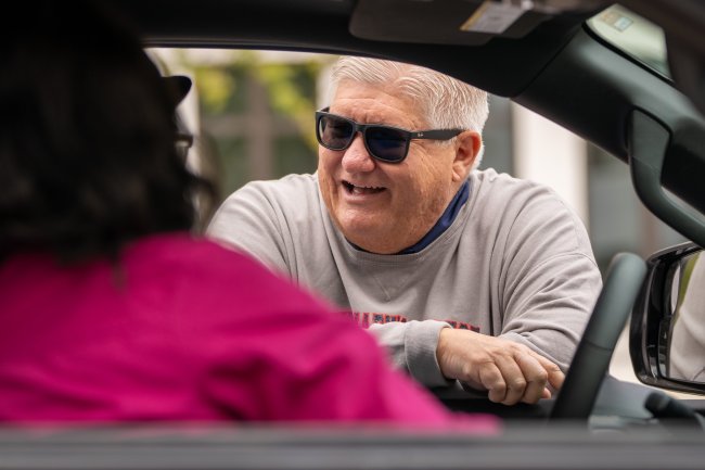 Roger and car window