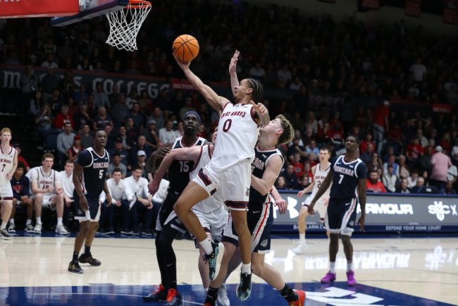 Basketball player Mikey Lewis shoots against Gonzaga in February 2026