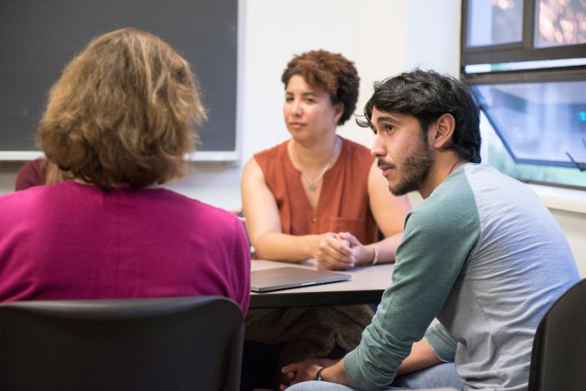 Students having a discussion in a counseling class