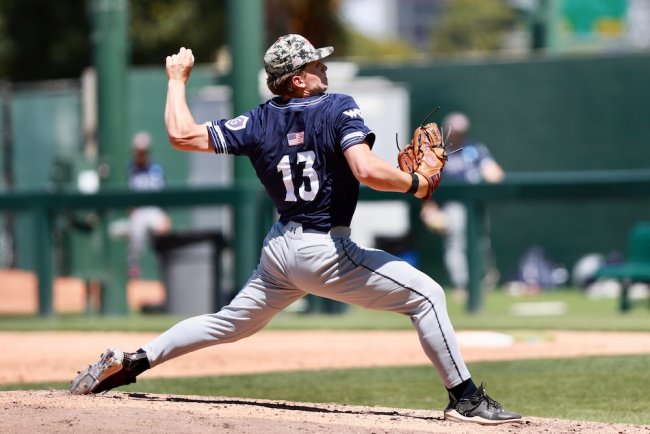 Pitcher Cam Staton throws against UCLA in 2026 NCAA Regional