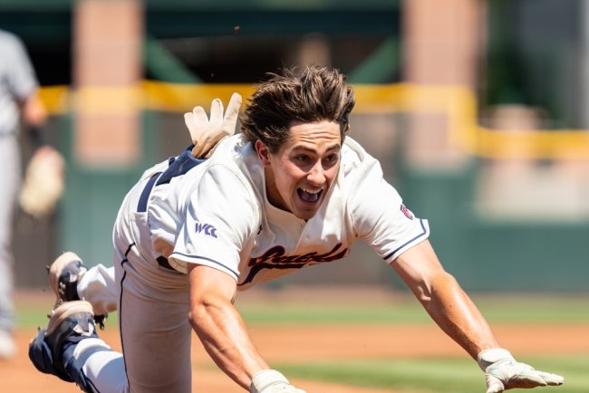 Baseball player Tanner Griffith slides into third against Pacific in 2026 WCC Tournament