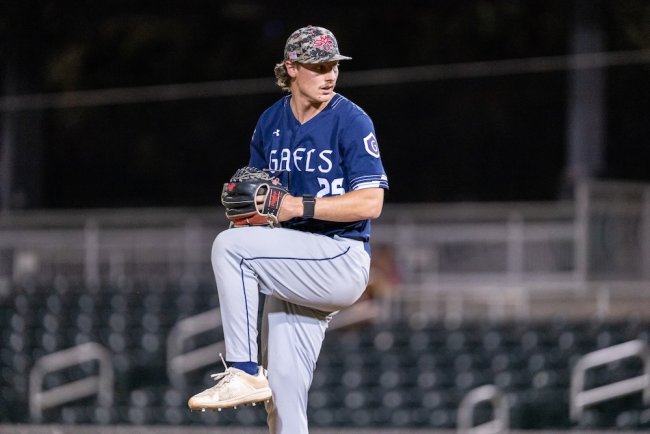 Baseball player John Damozonio pitches against Pepperdine in WCC Tournament in May 2026