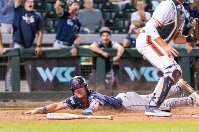 Baseball player Cody Kashimoto slides into home against Pepperdine in WCC Tournament in May 2026