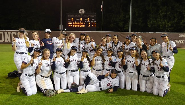 Saint Mary's Softball team poses as a group on the field after defeating Santa Clara in spring 2026