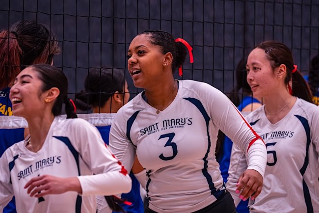 3 women's club volleyball players