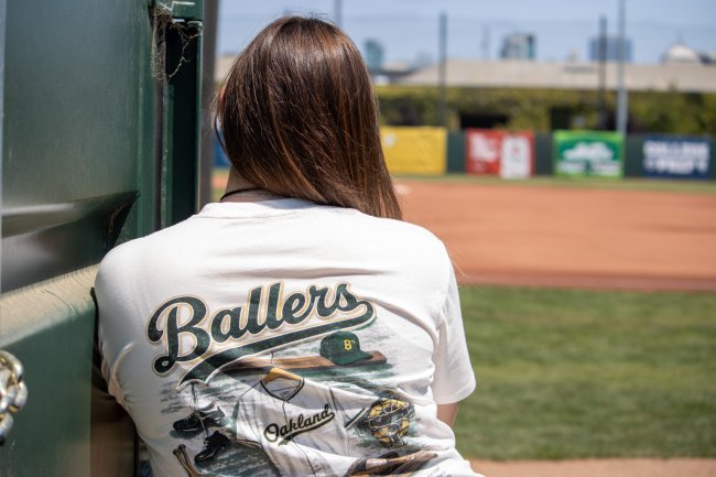 Mia Franceschi at Raimondi Station, shirt reading "Ballers"