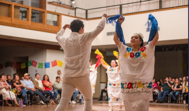 Two students dancing