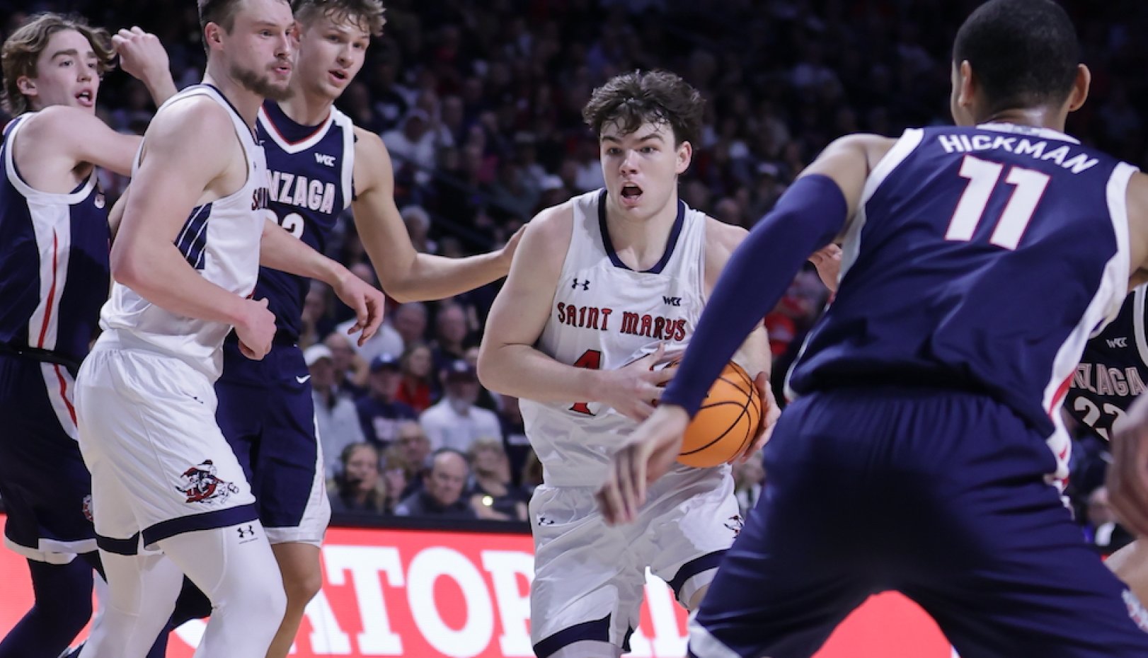 Men's basketball player Alex Ducas drives against Gonzaga in WCC Championship 2024