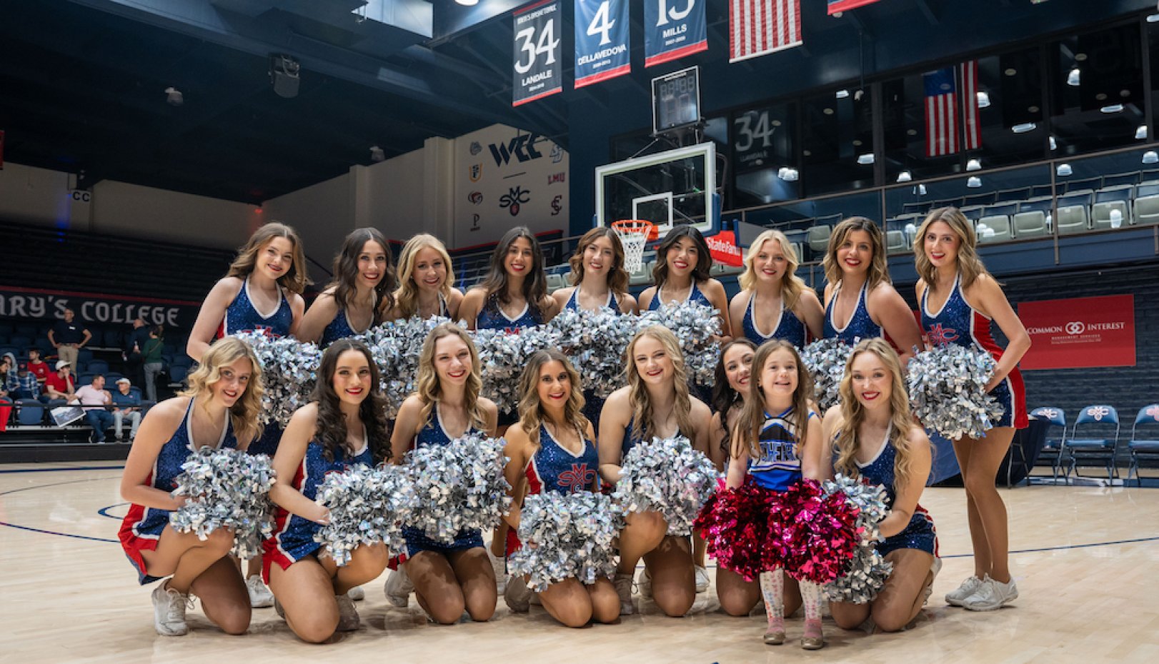 Young girl poses with SMC Spirit Team