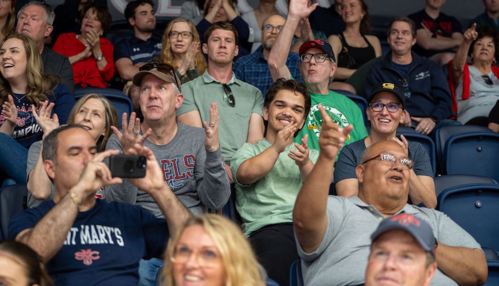 Fans cheer during 2024 NCAA Selection Sunday
