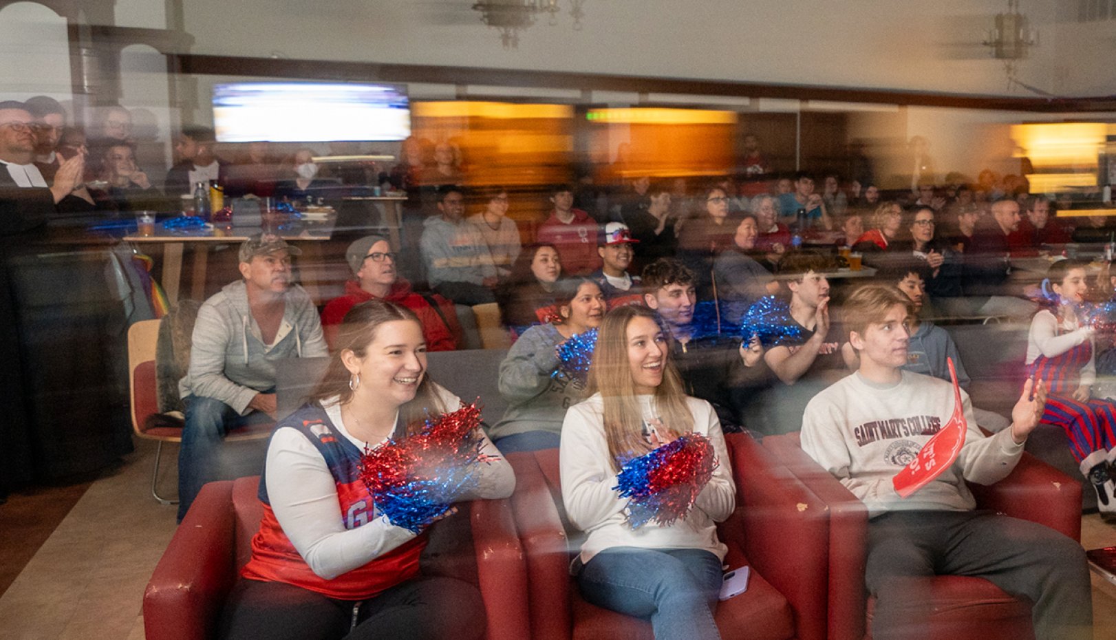 Students at watch party on SMC campus for 2024 NCAA Tournament