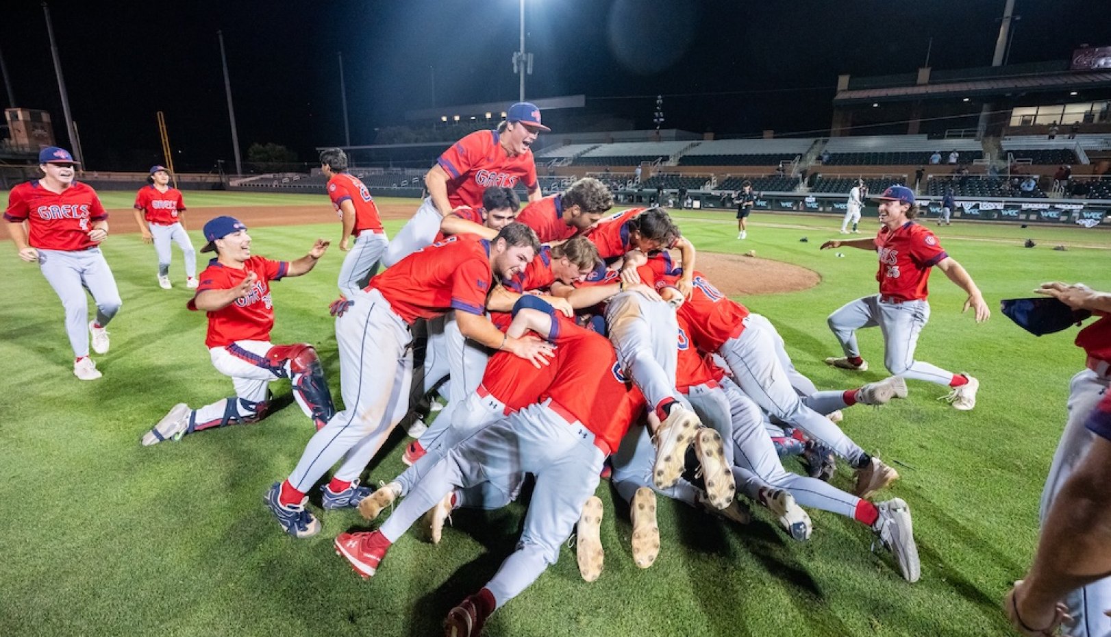 Baseball team leaps into a dogpile after Gaels defeat USF in 2026 WCC Championship