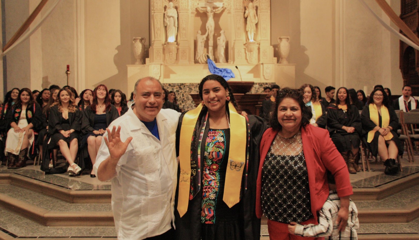 Student and family at Latinx Graduate Celebration 2026