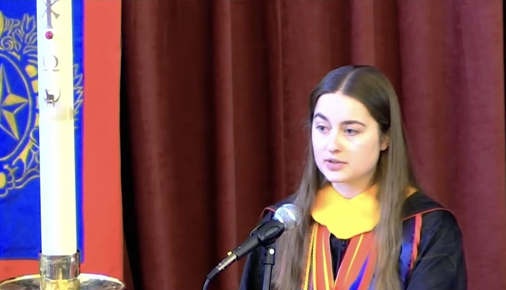 Caitlin Watt '26 speaking at Commencement Liturgy