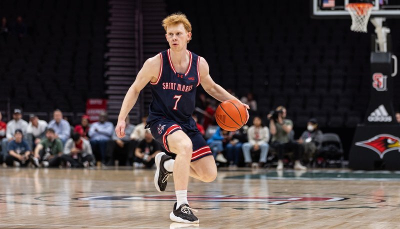 Basketball player Joshua Dent drives against Seattle in February 2026