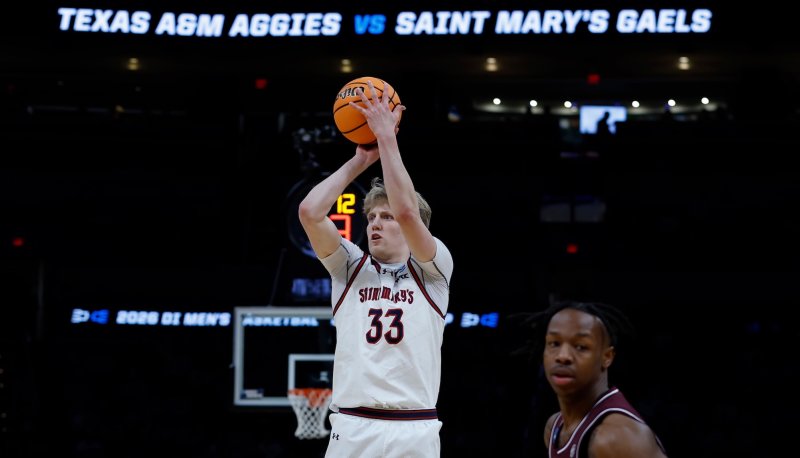 Basketball player Liam Campbell shoots against Texas A&amp;M in NCAA Tournament 2026