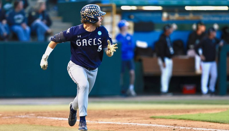 Baseball player Diego Castellanos runs after getting a hit against Cal Poly in 2026 NCAA Regional