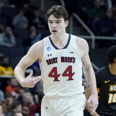 Basketball player Alex Ducas on the floor in Saint Mary's victory over VCU March 17, 2023