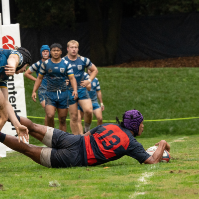 Men's Rugby Player Scores a Try