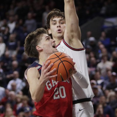 Men's basketball player Aidan Mahaney drives against Gonzaga in February 2024