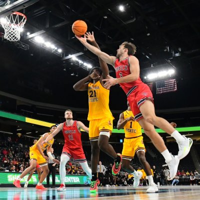 Men's Basketball player Augustas Marciulionis goes for the basket as the Gaels do battle with the Sun Devils in November 2024