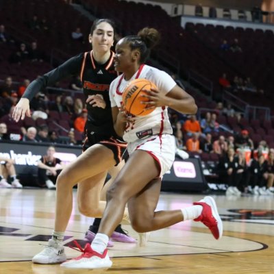 Women's basketball player Kennedy Johnson drives against Pacific in 2024-25 season