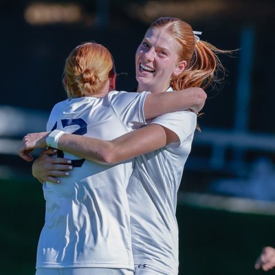Women's soccer players celebrate in fall 2024