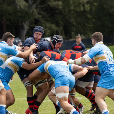 Men's Rugby push the ball forward during a maul