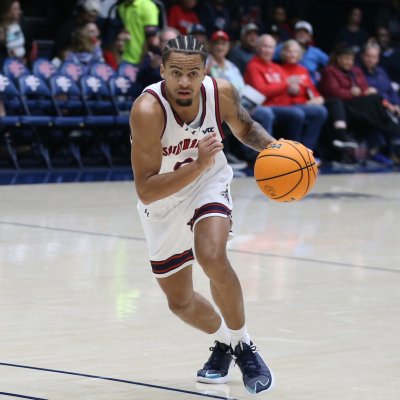 Men's Basketball player Mikey Lewis drives against North Texas in November 2025