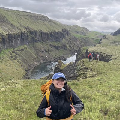 Aruna Silva with Sora Laxa river behind her