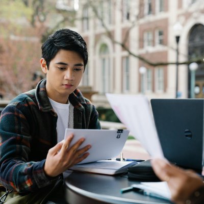 Student looking at handout