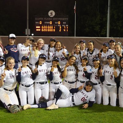 Softball team holding up index fingers to mark winning WCC title at Santa Clara in May 2026