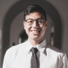 SMC alumni Alexander San smiling