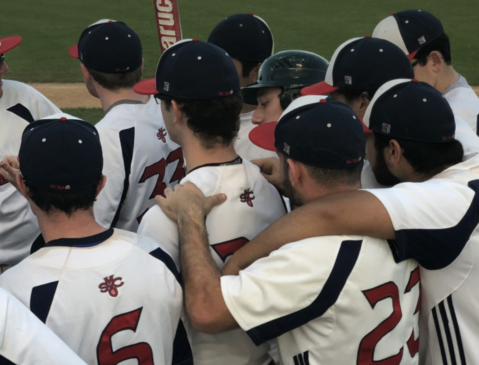 Baseball players huddling